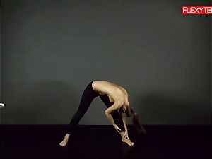 dark-haired gymnast showing of her butt